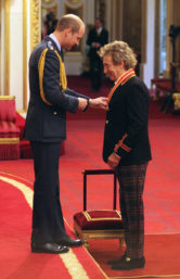 Veteran singer Sir Rod Stewart, right, is made a Knights Batchelor by Britain's William, the Duke of Cambridge, during an Investiture ceremony at Buckingham Palace in London, Tuesday Oct. 11, 2016. (Jonathan Brady/PA via AP)